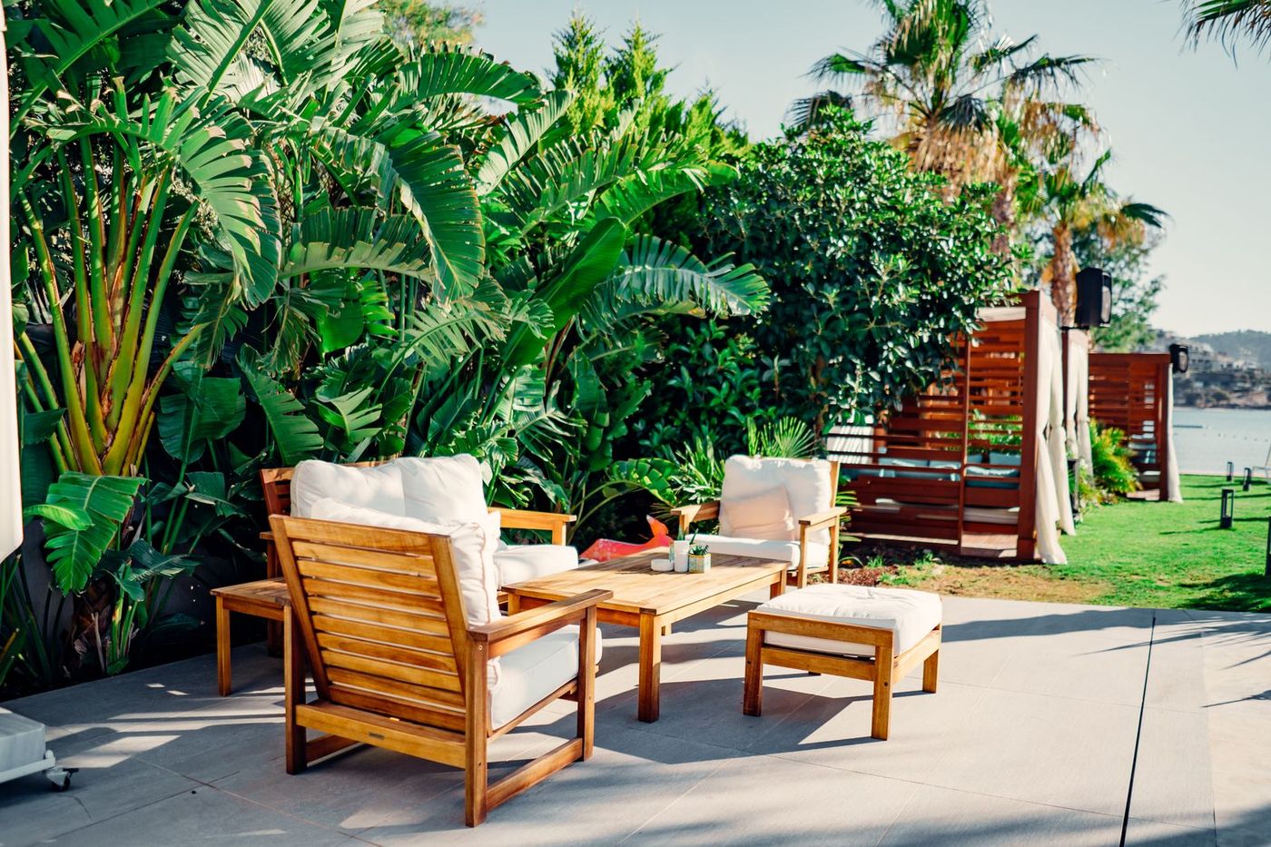 Garden seating surrounded by mature planting