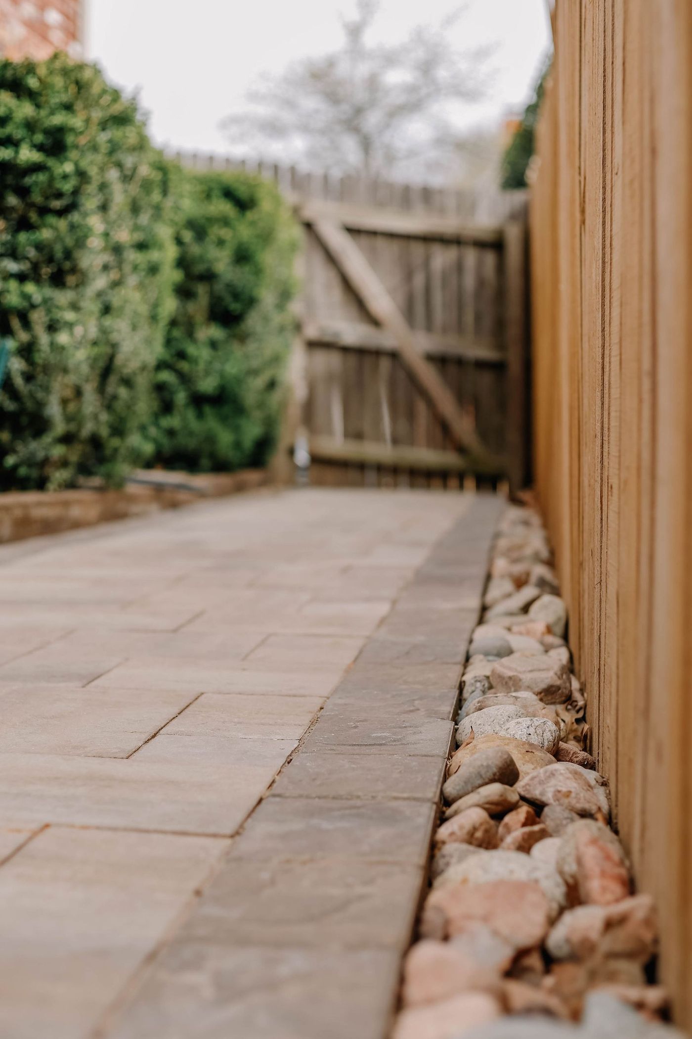 Gravel path with timber edging and low planting